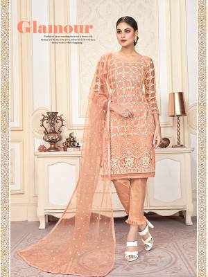 Look Pretty In This Designer Straight Suit In Peach Color. IT Heavy Embroidered Top And Dupatta Are Net Based Paired With Santoon Fabricated Bottom. ItsPretty Color And elegant Embroidery Will Give A Rich Look To Your Personality. 