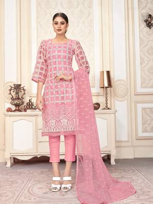 Look Pretty In This Designer Straight Suit In Pink Color. IT Heavy Embroidered Top And Dupatta Are Net Based Paired With Santoon Fabricated Bottom. ItsPretty Color And elegant Embroidery Will Give A Rich Look To Your Personality. 