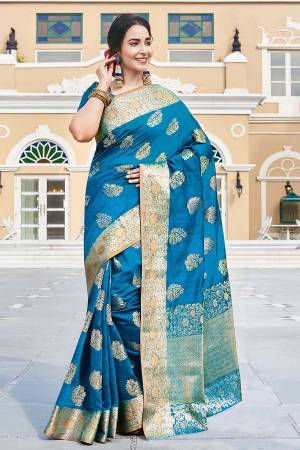 Celebrate This Festive Season Wearing This Pretty Blue Colored Designer Saree. This Saree And Blouse Are Fabricated On Art Silk Beautified With Weave All Over. Buy Now.