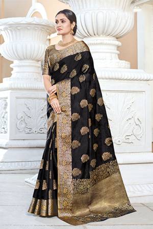 Celebrate This Festive Season Wearing This Pretty Black Colored Designer Saree. This Saree And Blouse Are Fabricated On Art Silk Beautified With Weave All Over. Buy Now.