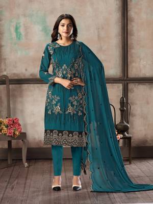 Grab This Pretty Designer Straight Suit In Blue Color Paired With Blue Colored Bottom And Dupatta. Its Top and Dupatta Are Georgette Based Paired With Santoon Bottom. Its Top Is Beautified With Pretty Embroidery Giving An Elegant Look. 