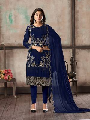 Grab This Pretty Designer Straight Suit In Navy Blue Color Paired With Blue Colored Bottom And Dupatta. Its Top and Dupatta Are Georgette Based Paired With Santoon Bottom. Its Top Is Beautified With Pretty Embroidery Giving An Elegant Look. 