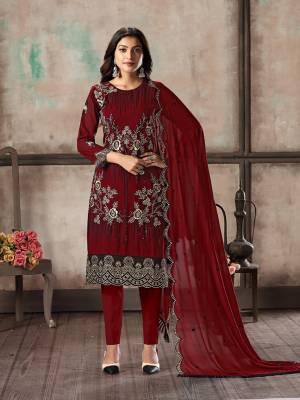 Grab This Pretty Designer Straight Suit In Red Color Paired With Blue Colored Bottom And Dupatta. Its Top and Dupatta Are Georgette Based Paired With Santoon Bottom. Its Top Is Beautified With Pretty Embroidery Giving An Elegant Look. 