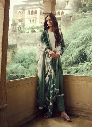 Simple and Elegant Looking Pretty Straight Suit Is Here In Pine Green And Cream Color. This Dress Material Is Crepe Based Paired With Georgette Fabricated Dupatta. Buy Now.