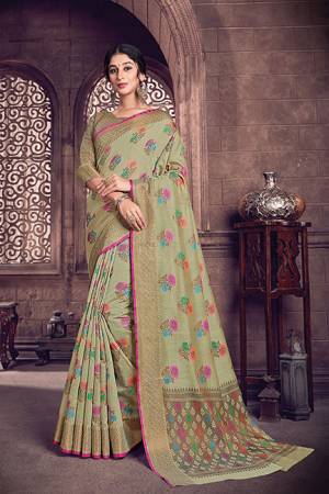 Flaunt Your Rich And Elegant Taste Wearing This Pastel Green Color Designer Saree. This Saree And Blouse Are Fabricated On Cotton Handloom Beautified With Weave All Over. 