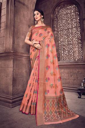 Look Pretty In This Pretty Peach Colored Designer Saree. This Saree And Blouse Are Fabricated On Cotton Handloom Beautified With Weave. Buy Now.