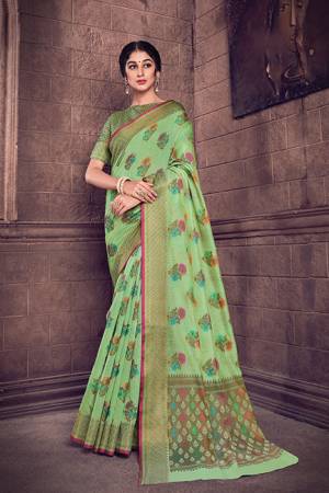 Flaunt Your Rich And Elegant Taste Wearing This Light Green Color Designer Saree. This Saree And Blouse Are Fabricated On Cotton Handloom Beautified With Weave All Over. 