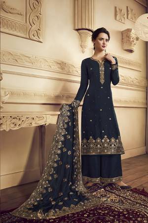 Flaunt Your Rich And Elegant Taste Wearing This Designer Straight Suit In Navy Blue Color.  This Pretty Embroidered Suit Is Fabricated On Crepe Which Is Light Weight, Soft Towards Skin And Easy To Carry All Day Long. 