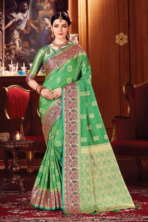 Adorn A Royal Looking Silk Based Designer Saree In Green Color. This Saree And Blouse Are Fabricated On Art Silk Beautified With Attractive Weave. 