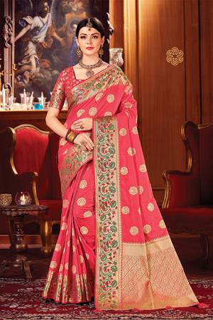 Adorn A Royal Looking Silk Based Designer Saree In Dark Pink Color. This Saree And Blouse Are Fabricated On Art Silk Beautified With Attractive Weave. 