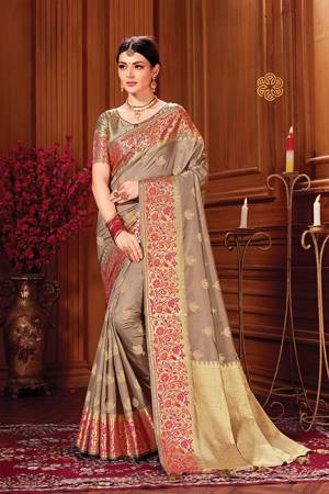Adorn A Royal Looking Silk Based Designer Saree In Beige Color. This Saree And Blouse Are Fabricated On Art Silk Beautified With Attractive Weave. 
