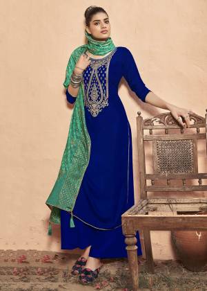 Look Attractive Wearing This New Pattenered Designer Straight Suit In Royal Blue Color Paired With Sea Green Colored Dupatta. Its Top Is Fabricated On Velvet Paired With Santoon Bottom And Chinon Dupatta. Its Top Is Beautified With Neck Embroidery And Dupatta Has Pretty Badhani Prints. 