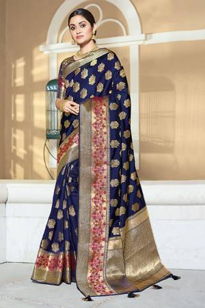 Grab This Very Beautiful And Attractive Looking Saree In Navy Blue Color. This Saree and Blouse Are Rich Art Silk Based Beautified With Weave. 