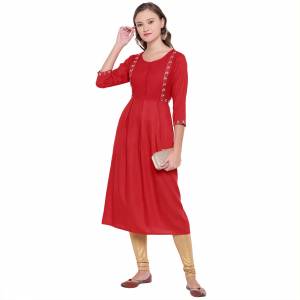 Grab This Readymade Kurti In Red Color For Your Casual Or Semi-Casual Which Is Fabricated On Rayon. This Kurti Is Light In Weight And Also Its Fabric Ensures Superb And Its Easy To Care For.