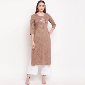 Grab This Readymade Kurti In Light Brown  Color For Your Casual Or Semi-Casual Which Is Fabricated On Rayon. This Kurti Is Light In Weight And Also Its Fabric Ensures Superb And Its Easy To Care For.