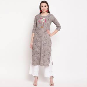 Here Is A Simple And Elegant Looking Readymade Kurti In Grey Color Fabricated On Rayon. This Kurti Is Light In Weight And Can Be Paired With Same Or Contrasting Colored Bottom
