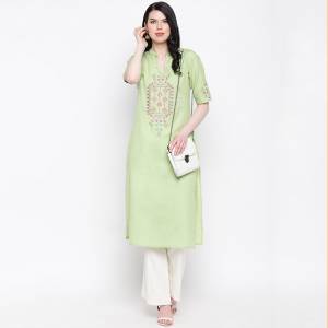 Here Is A Simple And Elegant Looking Readymade Kurti In Light Green Color Fabricated On Cotton. This Kurti Is Light In Weight And Can Be Paired With Same Or Contrasting Colored Bottom
