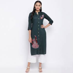 Add This Pretty Simple Kurti To Your Wardrobe In Teal Green color Fabricated On Slub Cotton. This Readymade Kurti Is Suitable For Daily Or Office Wear.