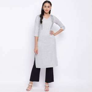 Here Is A Simple And Elegant Looking Readymade Kurti In Light Grey Color Fabricated On Rayon. This Kurti Is Light In Weight And Can Be Paired With Same Or Contrasting Colored Bottom