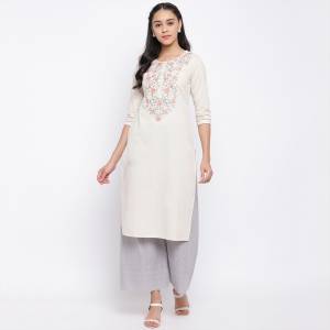 Here Is A Simple And Elegant Looking Readymade Kurti In White Color Fabricated On Cotton. This Kurti Is Light In Weight And Can Be Paired With Same Or Contrasting Colored Bottom