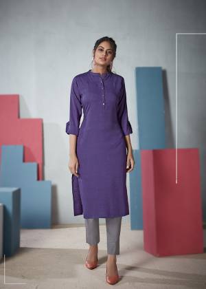 Add This Elegant Looking Plain Kurti To Your Wardrobe In Violet Color. This Readymade Straight Kurti Is Fabricated On Two Tone Rayon And Available In All Regular Sizes. 