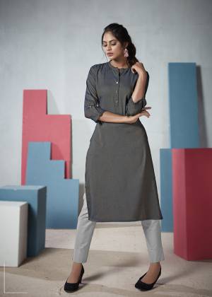 Add This Elegant Looking Plain Kurti To Your Wardrobe In Grey Color. This Readymade Straight Kurti Is Fabricated On Two Tone Rayon And Available In All Regular Sizes. 