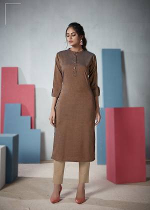 Add This Elegant Looking Plain Kurti To Your Wardrobe In Brown Color. This Readymade Straight Kurti Is Fabricated On Two Tone Rayon And Available In All Regular Sizes. 