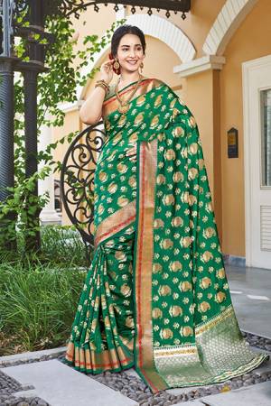 Grab This Very Pretty Designer Silk Based Saree In Green Color. This Saree And Blouse Are Fabricated On Handloom Silk Beautified with Weaved Motifs. It Is Light Weight, Durable And Easy To Care For.