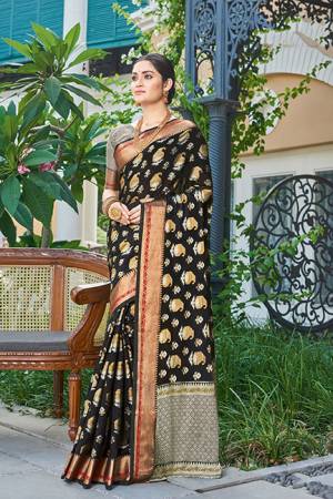 Grab This Very Pretty Designer Silk Based Saree In Black Color. This Saree And Blouse Are Fabricated On Handloom Silk Beautified with Weaved Motifs. It Is Light Weight, Durable And Easy To Care For.