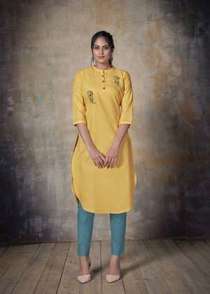 Grab This Readymade straight Kurti In Yellow Color Fabricated On Cotton. It Is Beautified With Thread Embroidery And Available In All Regular Sizes. 