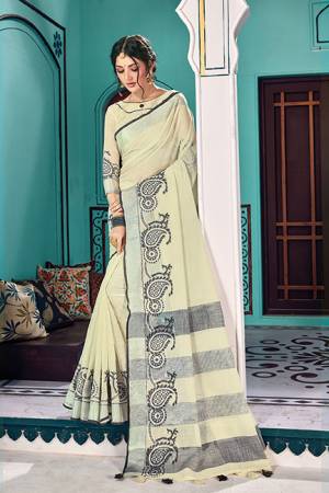 Simple And Elegant Looking Saree In Off-White Color Paired With Off-White Colored Blouse. This Saree And Blouse Are Fabricated On Linen Cotton Beautified With Weave. Buy Now.