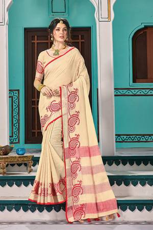 Simple And Elegant Looking Saree In Cream Color Paired With Cream Colored Blouse. This Saree And Blouse Are Fabricated On Linen Cotton Beautified With Weave. Buy Now.
