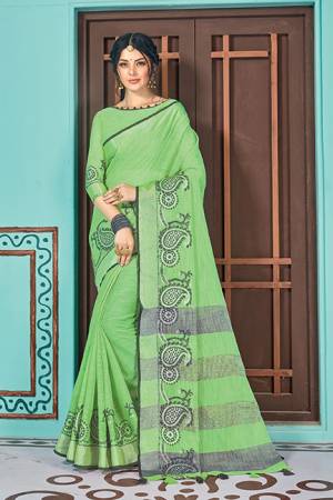 Simple And Elegant Looking Saree In Green Color Paired With Green Colored Blouse. This Saree And Blouse Are Fabricated On Linen Cotton Beautified With Weave. Buy Now.