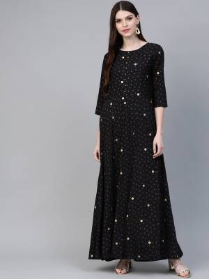 Simple And Elegant Looking Readymade Long Kurti Is Here In Black Color Paired With Black Colored Bottom. This Pair Is Fabricated On Crepe Beautified With Prints. 