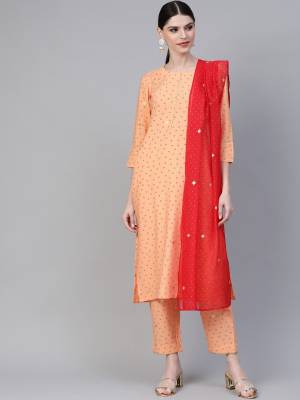 Look Pretty In This Elegant Looking Readymade Straight Suit In Orange Color Paired With Red Colored Dupatta. Its Top And Bottom Are Crepe Based Paired With Orgenza Fabricated Dupatta. 