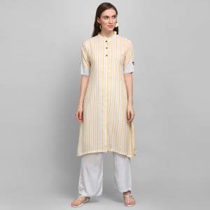 For Your Casual Or Semi-Casual Wear, Grab This Simple And Elegant Looking Readymade Pair Of Kurti and Plazzo In Yellow And Grey. This Pair Is Rayon Based Which Is Soft Towards Skin And Ensures Superb Comfort All Day Long. 