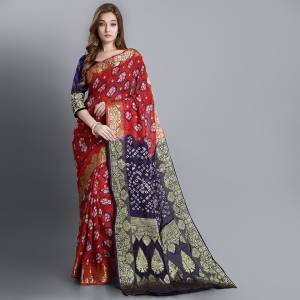For A Proper Traditional Look, Grab This Pretty Saree In Red And Violet Color. This Saree and Blouse Are Viscose Georgette Based Beautified With Bandhani Prints. Buy This Pretty Saree Now.