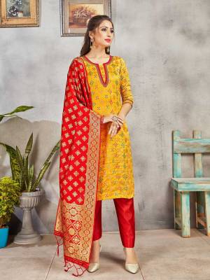 Grab This Pretty Designer Straight Suit In Yellow And Red Color. Its Top, Bottom And Dupatta Are Fabricated On Banarasi Art Silk Beautified With Weave. Its Fabric and Color Gives A Rich Look To Your Perosnality. 