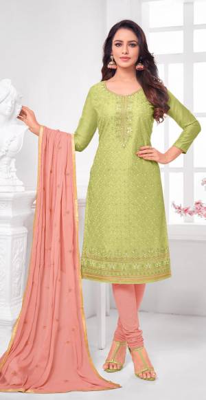 Here Is A Pretty Designer Straight Suit In Light Green Color Paired With Contrasting Baby Pink Colored Bottom and Dupatta. Its Top Is Modal Silk Based Paired With Cotton Bottom and Chiffon Dupatta. All Its Fabrics Are Light Weight And Easy To Carry All Day Long