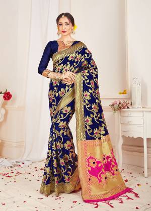 Add This Pretty Designer Saree to Your Wardribe In Navy Blue Color. This Saree And Blouse Are Fabricated On Banarasi Art Silk Beautified With Bold And Attractive Weave. Its Lovely Floral Pattern And Rich FabricWill Earn You Lots Of Compliments From Onlookers. 