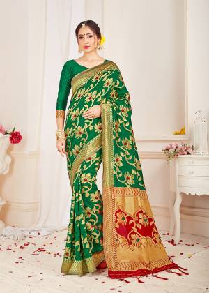 Celebrate this Festive Season With Beauty And Comfort Wearing This Pretty Saree In Green Color. This Saree And Blouse Are Fabricated On Banarasi Art Silk Beautified With Weave. Buy Now.