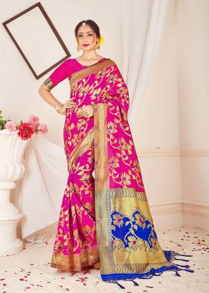 Add This Pretty Designer Saree to Your Wardribe In Rani Pink Color. This Saree And Blouse Are Fabricated On Banarasi Art Silk Beautified With Bold And Attractive Weave. Its Lovely Floral Pattern And Rich FabricWill Earn You Lots Of Compliments From Onlookers. 