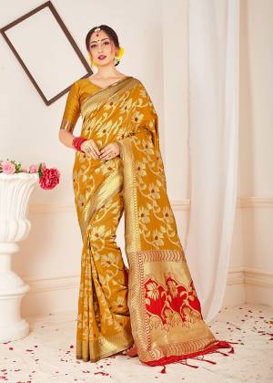 Celebrate this Festive Season With Beauty And Comfort Wearing This Pretty Saree In Musturd Yellow Color. This Saree And Blouse Are Fabricated On Banarasi Art Silk Beautified With Weave. Buy Now.
