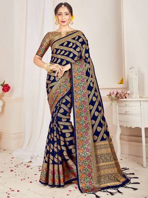 Adorn A Lovely Traditional Look Wearing This Pretty Silk Based Saree In Navy Blue Color. This Saree And Blouse Are Fabricated On Banarasi Art Silk Beautified With Weave All Over. Buy 