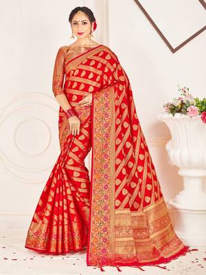 Adorn A Lovely Traditional Look Wearing This Pretty Silk Based Saree In Red Color. This Saree And Blouse Are Fabricated On Banarasi Art Silk Beautified With Weave All Over. Buy 