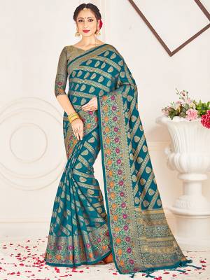Adorn A Lovely Traditional Look Wearing This Pretty Silk Based Saree In Blue Color. This Saree And Blouse Are Fabricated On Banarasi Art Silk Beautified With Weave All Over. Buy 