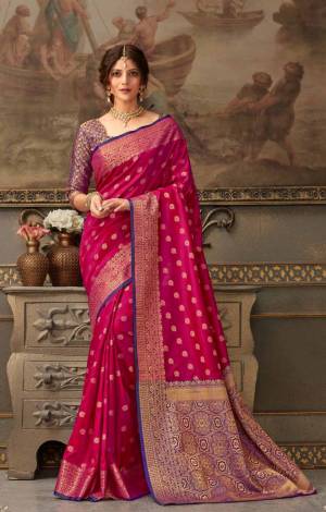 Look Attractive Wearing This Beautiful Designer Silk Based Saree In Dark Pink Color Paired With Purple Colored Blouse. This Saree And Blouse Are Fabricated On Handloom Silk Beautified With Weave All Over. It Is Light In Weight And Easy To Carry All Day Long. 