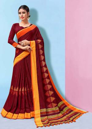 Grab This Pretty Simple Printed Saree In Maroon Color Paired with Maroon Colored Blouse. This Saree And Blouse Are Fabricated On Linen Beautified With Prints. Its Rich Fabric And Color Will Earn You Lots Of Compliments From onlookers. 