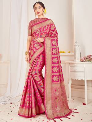 Shine Bright Wearing This Pretty Designer Dark Pink Colored Heavy Weaved Saree. This Saree And Blouse Are Fabricated On Banarasi Art Silk Beautified With Weave All Over. It Is Suitable For Upcoming Wedding And Festive Season. Buy Now.