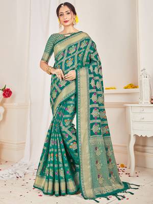 Shine Bright Wearing This Pretty Designer Teal Green Colored Heavy Weaved Saree. This Saree And Blouse Are Fabricated On Banarasi Art Silk Beautified With Weave All Over. It Is Suitable For Upcoming Wedding And Festive Season. Buy Now.